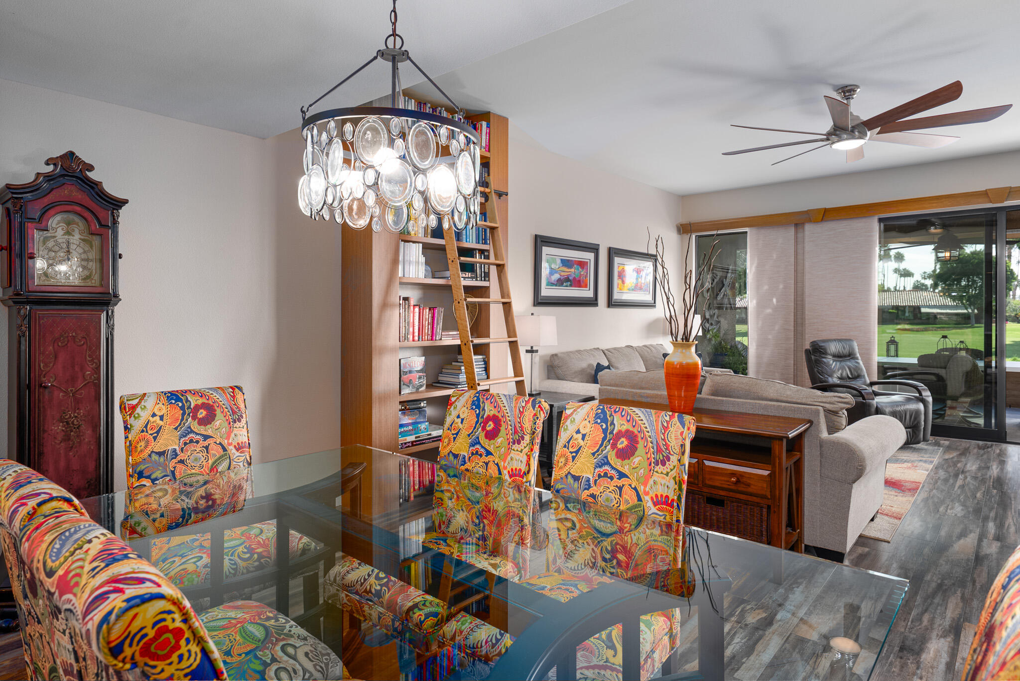 6 Sunrise Drive Rancho Mirage, CA 92270 - Photo 14 of 48 a living room with furniture and a chandelier