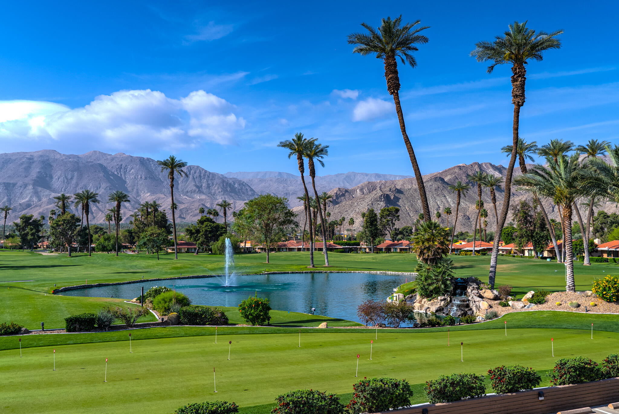 6 Sunrise Drive Rancho Mirage, CA 92270 - Photo 2 of 48 a view of a golf course with a garden