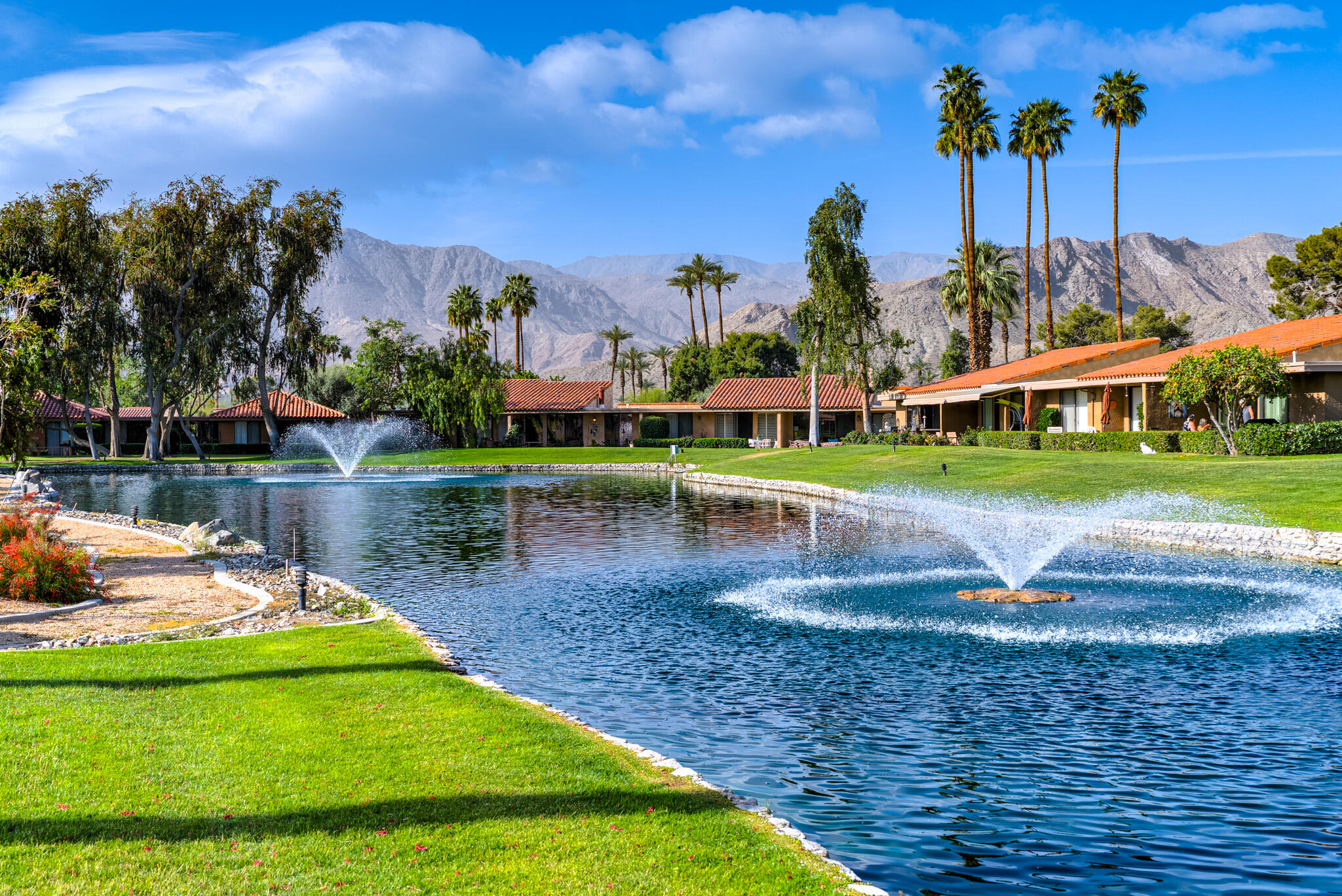 6 Sunrise Drive Rancho Mirage, CA 92270 - Photo 3 of 48 a view of a park with large trees