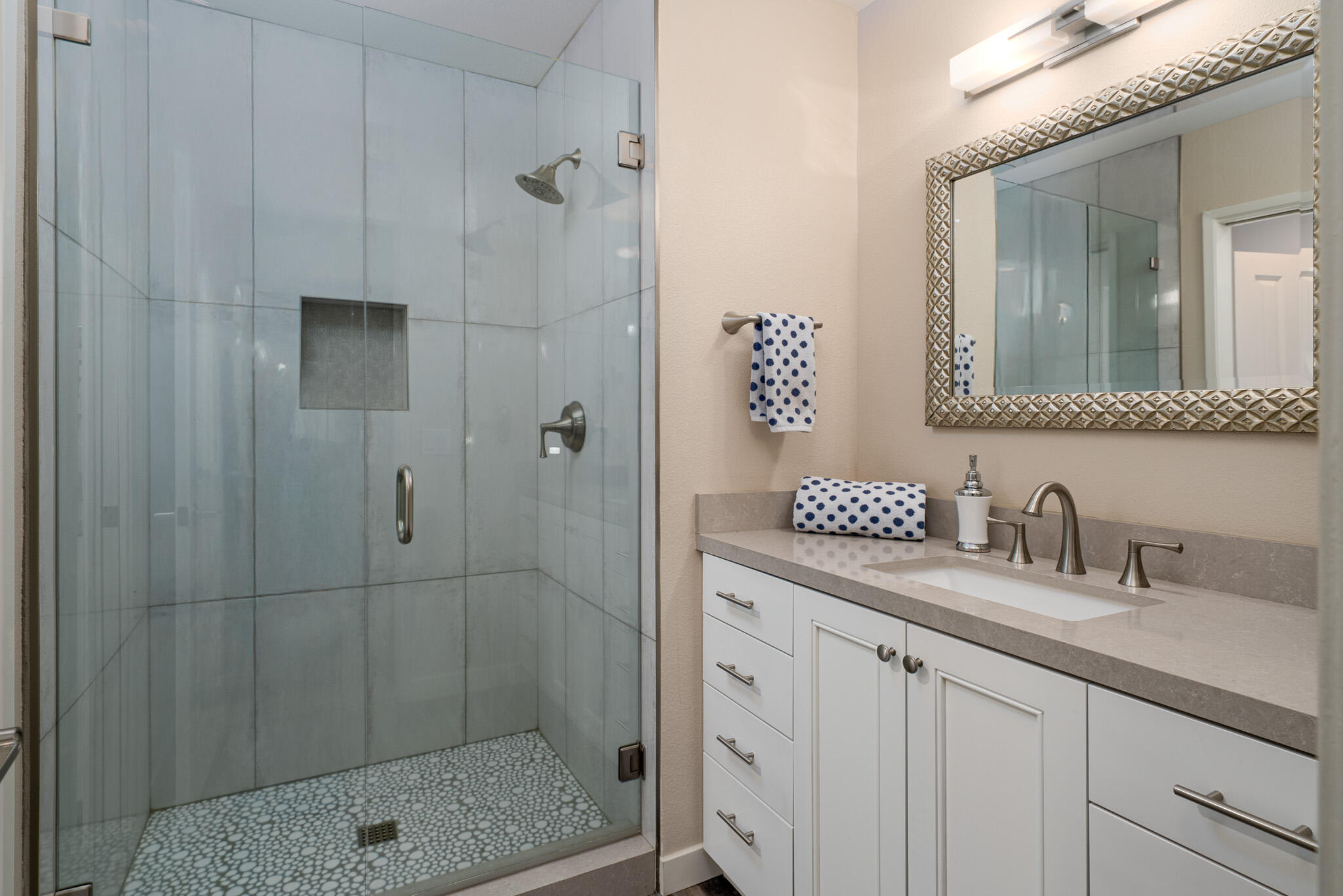 6 Sunrise Drive Rancho Mirage, CA 92270 - Photo 32 of 48 a bathroom with a shower sink and mirror