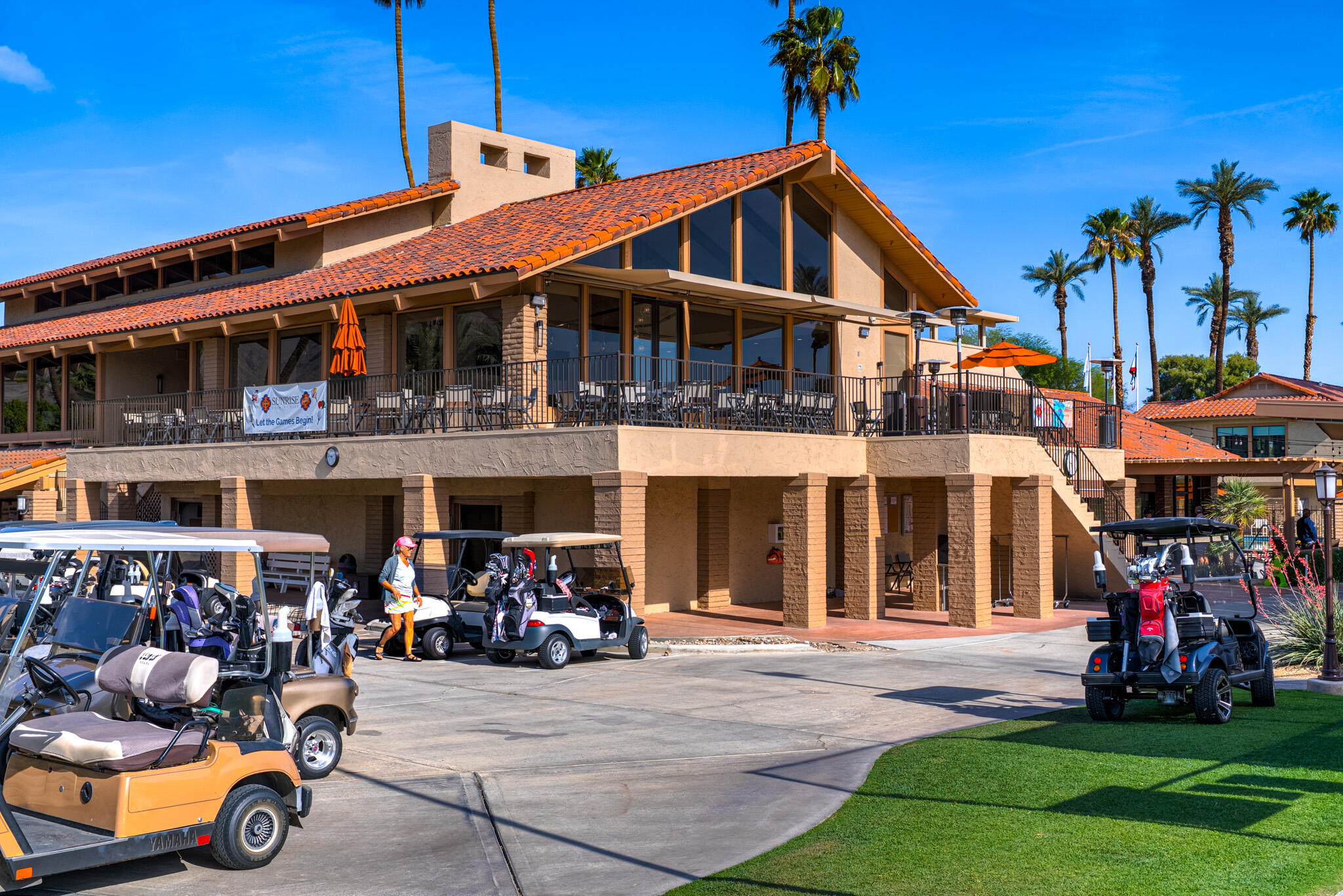 6 Sunrise Drive Rancho Mirage, CA 92270 - Photo 38 of 48 a front view of a house with garden