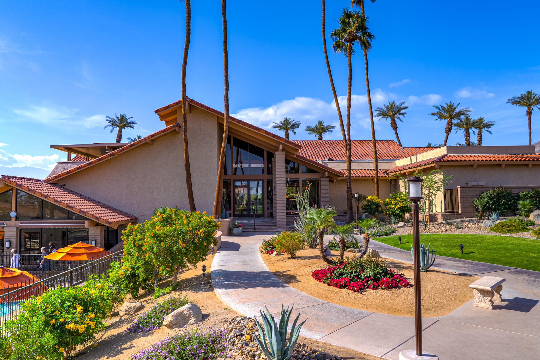 6 Sunrise Drive Rancho Mirage, CA 92270 - Photo 39 of 48 a view of a patio with table and chairs potted plants