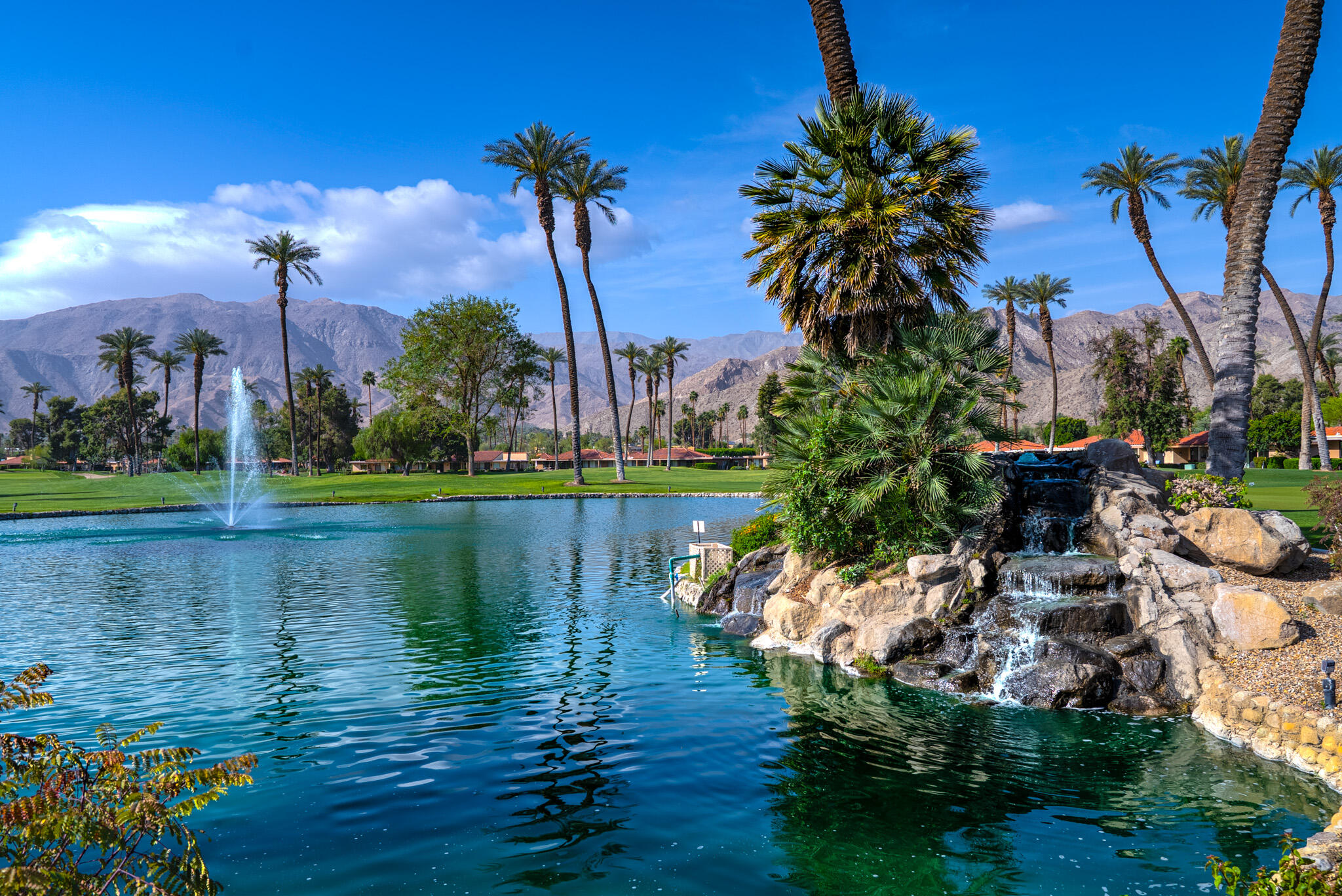 6 Sunrise Drive Rancho Mirage, CA 92270 - Photo 47 of 48 a lake view with a table and chairs