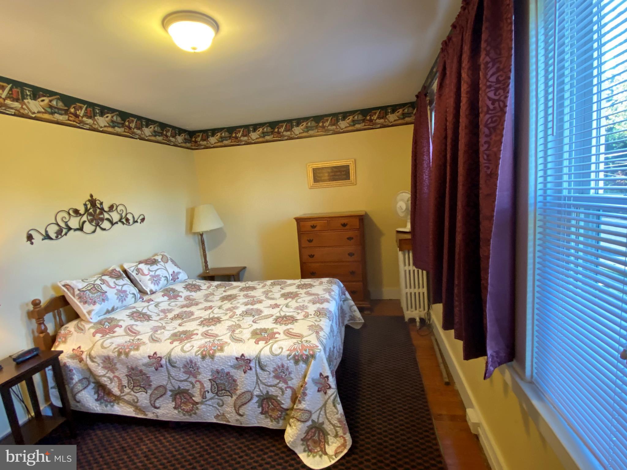 874 Pleasure Road Lancaster, PA 17601 - Photo 23 of 42 MASTER BEDROOM W/ WALL OF WINDOWS
