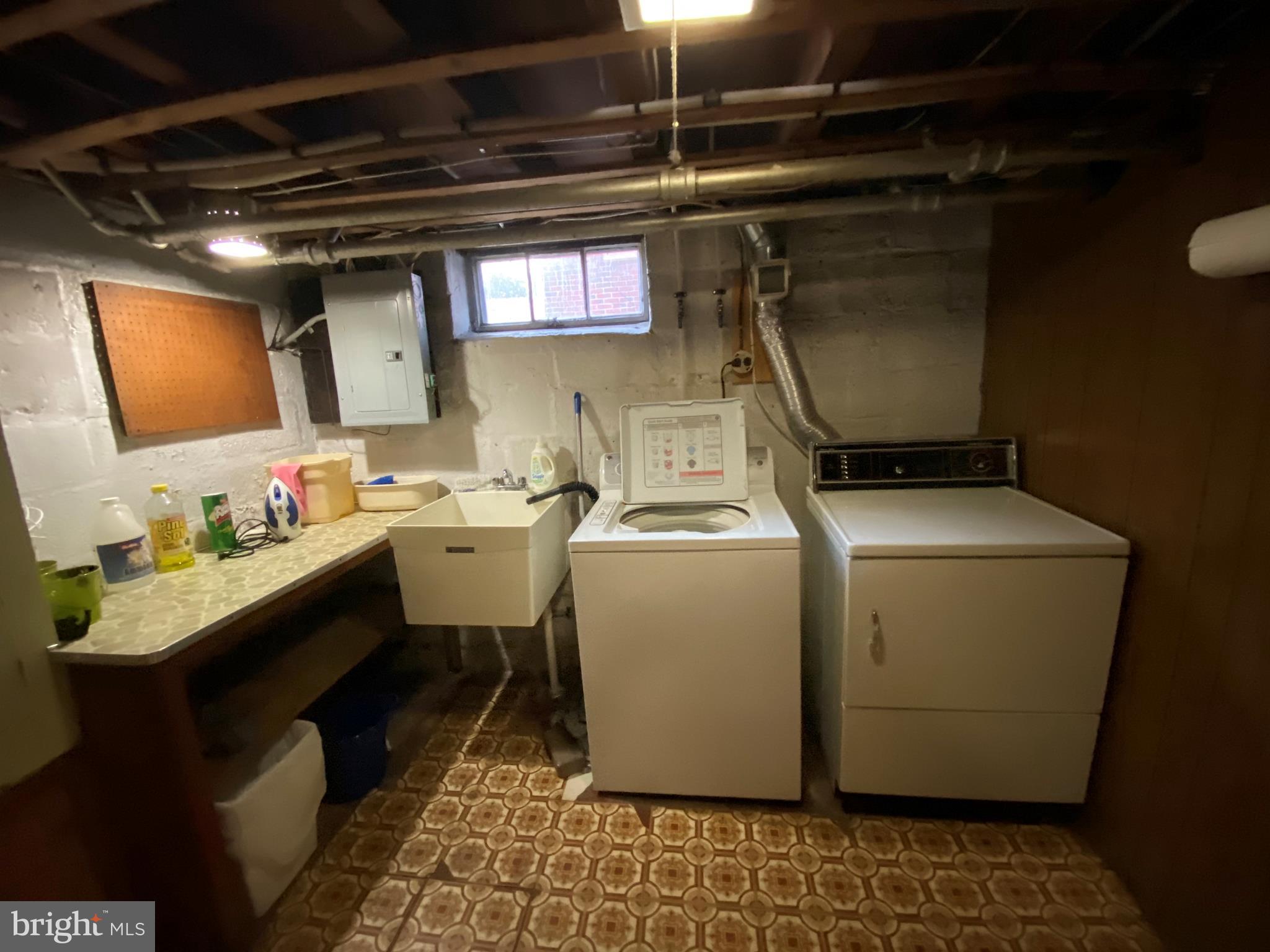874 Pleasure Road Lancaster, PA 17601 - Photo 34 of 42 CONVENIENT LAUNDRY W/ FOLDING TABLE