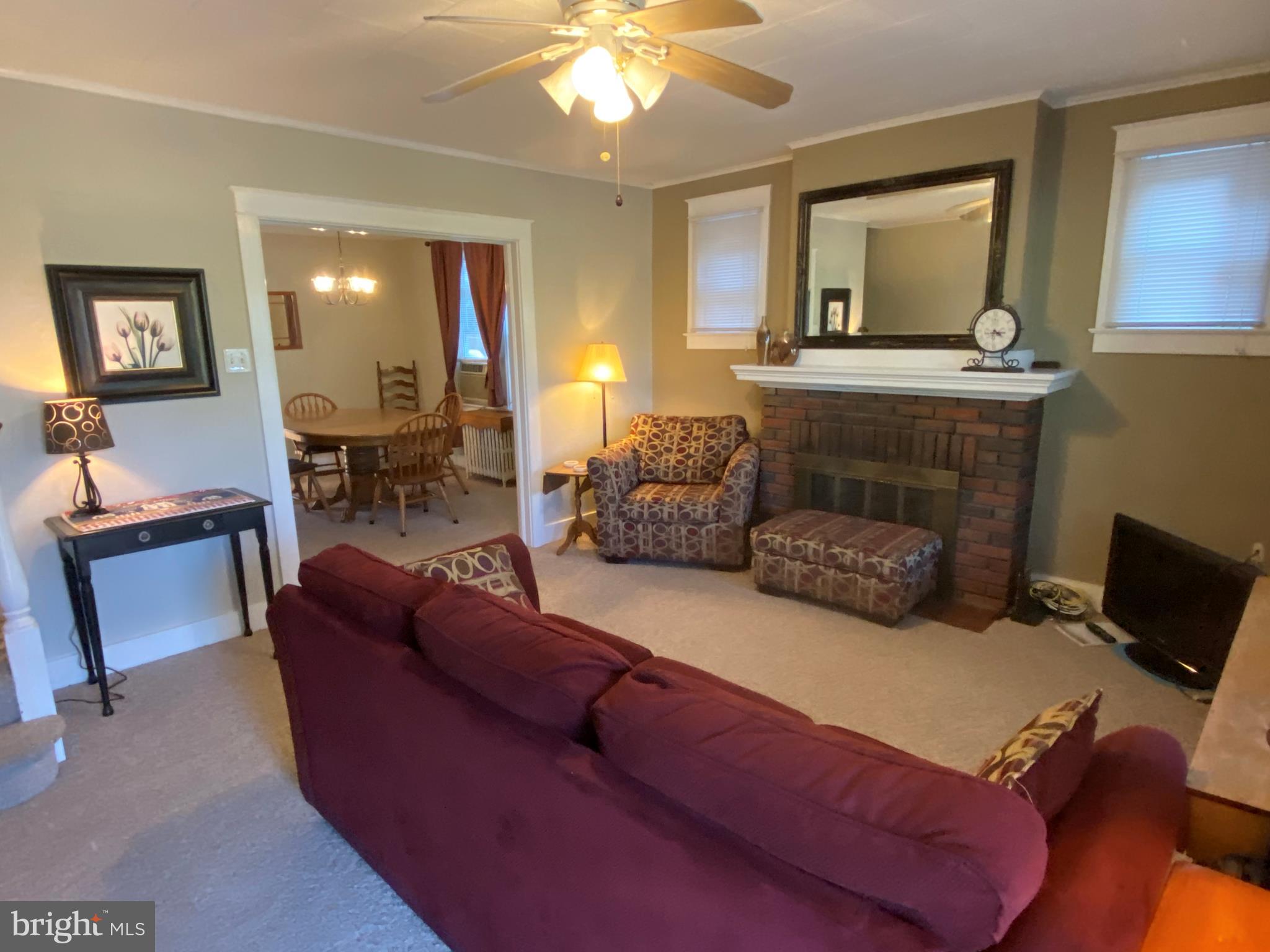 874 Pleasure Road Lancaster, PA 17601 - Photo 6 of 42 WELCOME IN! LIVING ROOM W/ WOOD FIREPLACE