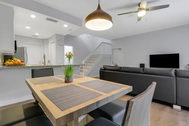a view of a dining room with furniture