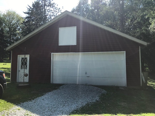 1283 Center Road Clinton, OH 44216 - Photo 3 of 33 2+ CAR DETACHED GAR - NEWER DOOR OPENER