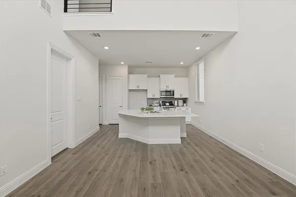 a view of kitchen with wooden floor