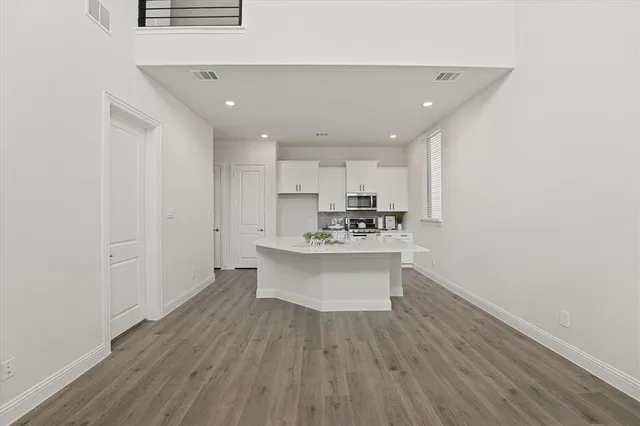 a view of kitchen with wooden floor