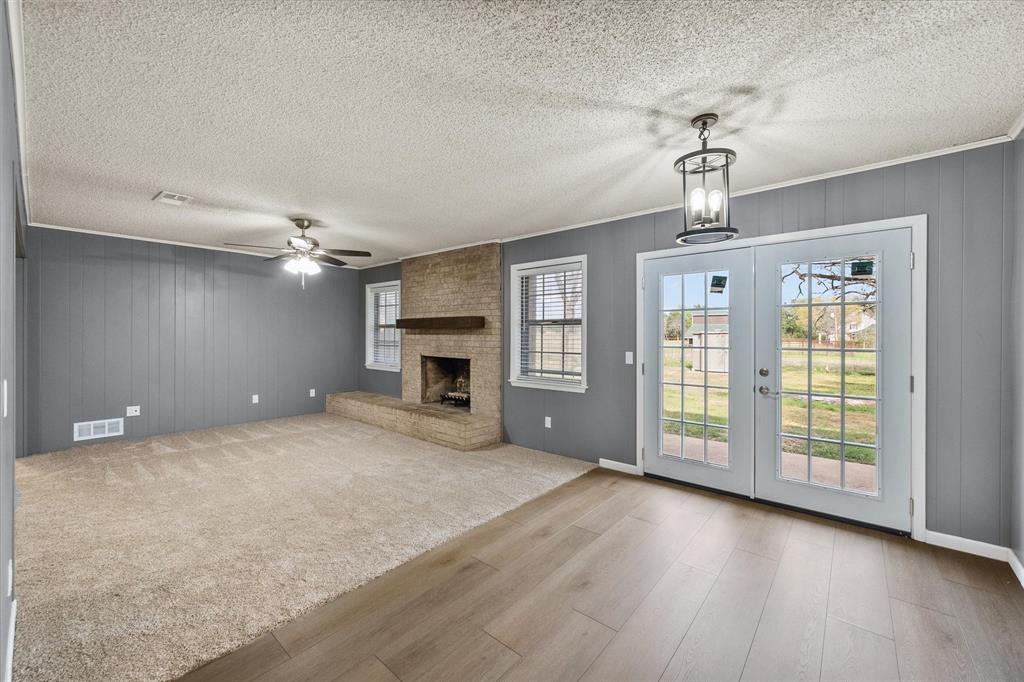 536 Robindale Lane Fairfield, TX 75840 - Photo 12 of 38 a view of an empty room with a window and fireplace