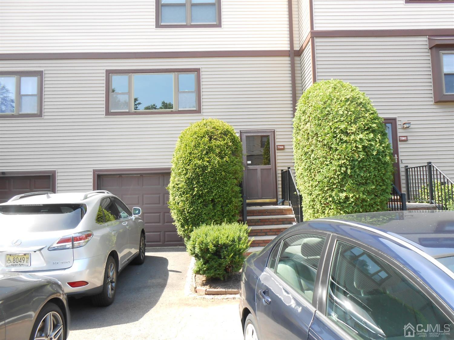 7206 Hana Road Edison, NJ 08817 - Photo 1 of 26 a view of backyard with outdoor seating