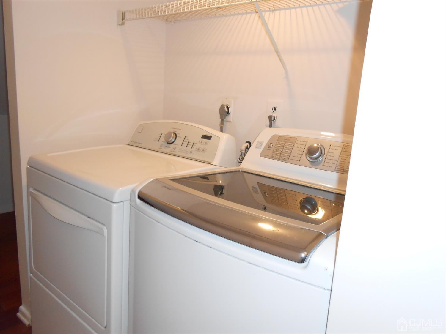 7206 Hana Road Edison, NJ 08817 - Photo 21 of 26 a utility room with dryer and washer