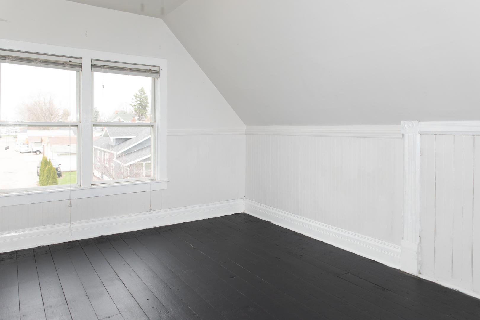 544 24th Avenue Moline, IL 61265 - Photo 19 of 24 wooden floor in an empty room with a window