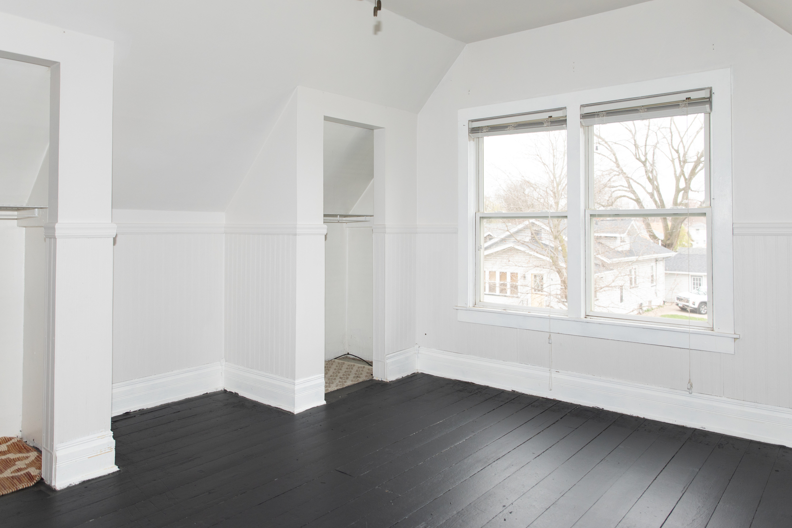544 24th Avenue Moline, IL 61265 - Photo 20 of 24 an empty room with wooden floor and windows