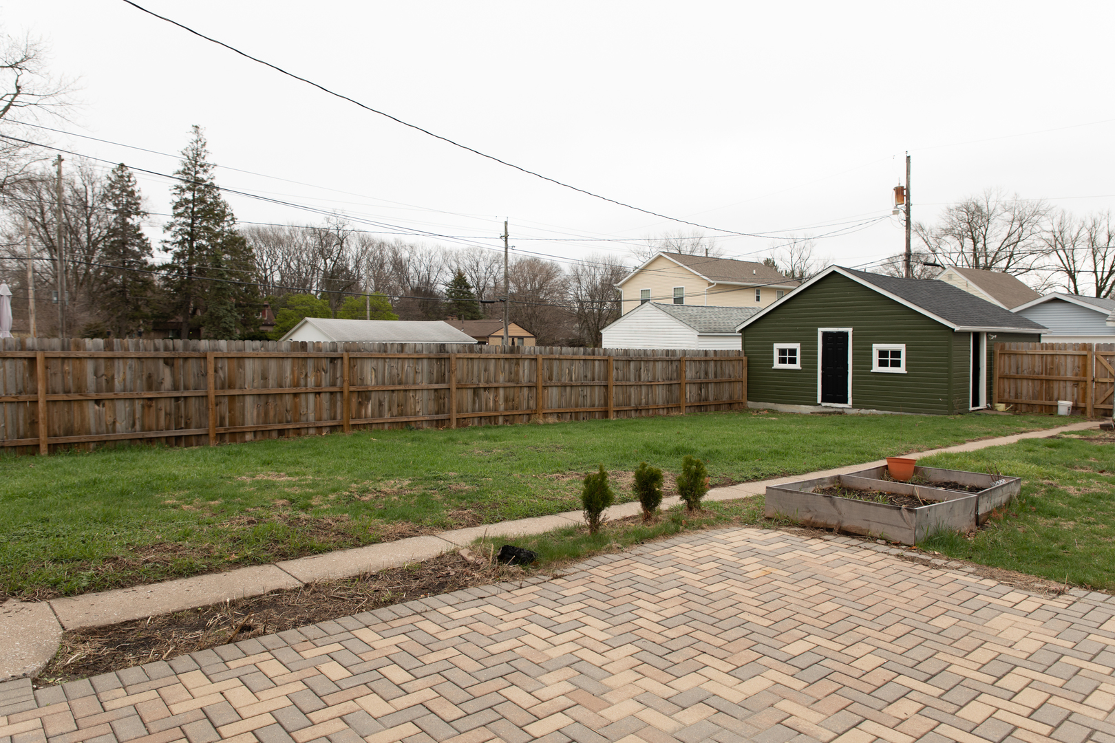 544 24th Avenue Moline, IL 61265 - Photo 21 of 24 a front view of a house with garden
