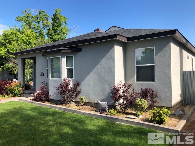 259 West Arroyo Street Reno, NV 89509 - Photo 1 of 24 a front view of a house with a yard