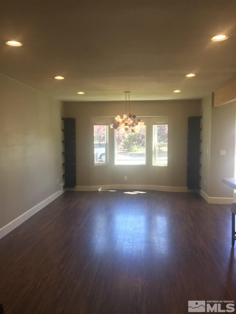 259 West Arroyo Street Reno, NV 89509 - Photo 16 of 24 an empty room with wooden floor and windows