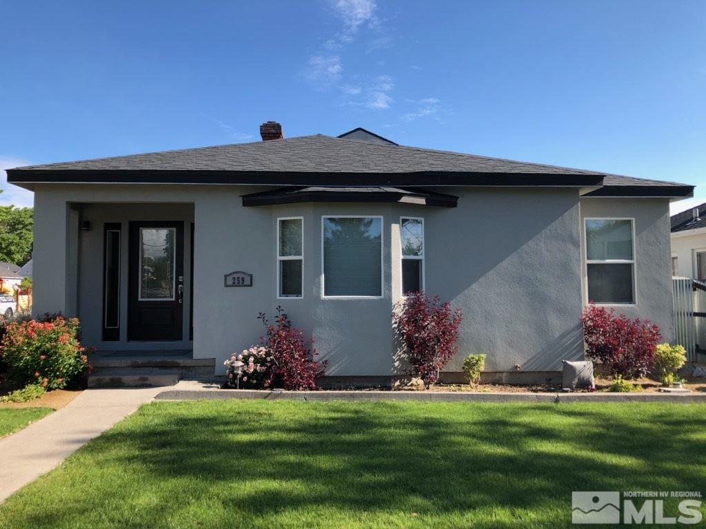 259 West Arroyo Street Reno, NV 89509 - Photo 3 of 24 a front view of a house with a garden