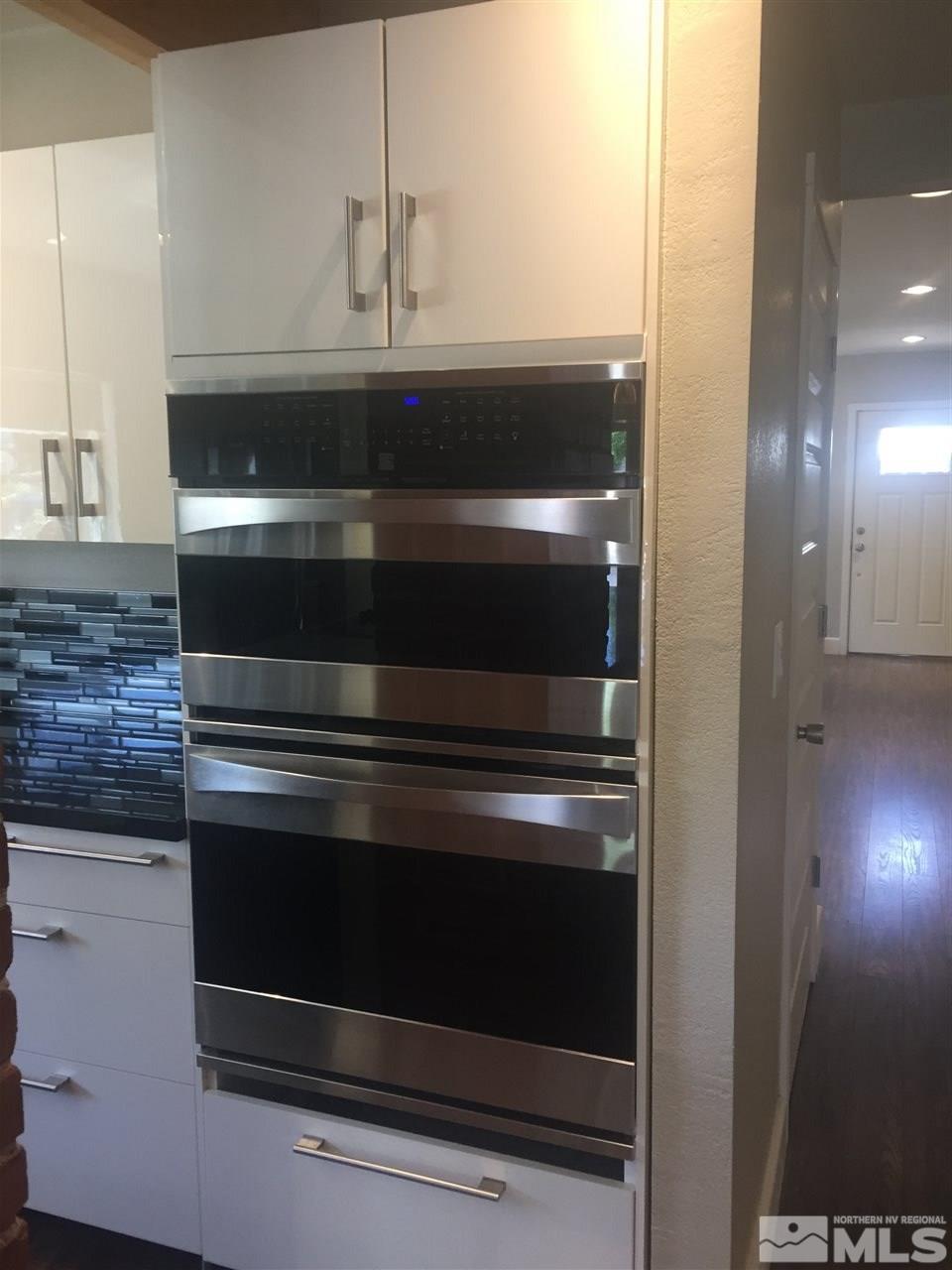259 West Arroyo Street Reno, NV 89509 - Photo 10 of 24 a stove top oven sitting inside of a kitchen