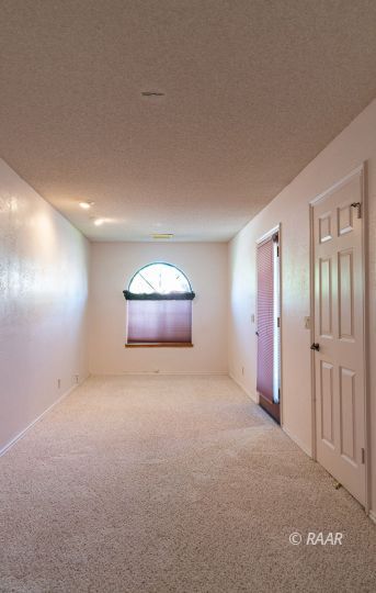 323 West Pilgrim Court Ridgecrest, CA 93555 - Photo 16 of 35 a view of an empty room