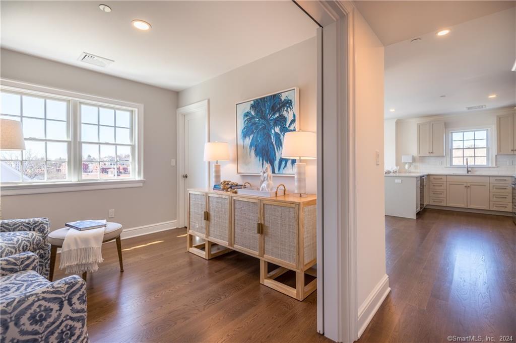201 Main Street, Unit 203 Westport, CT 06880 - Photo 23 of 40 a view of a room with wooden floor and furniture
