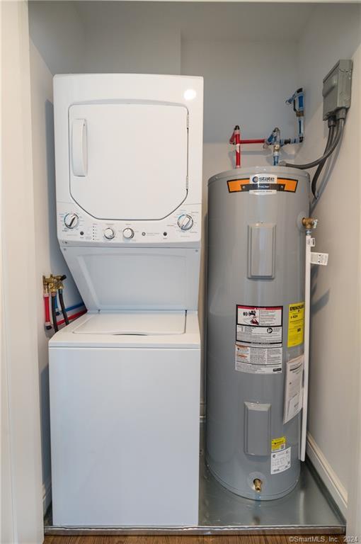 201 Main Street, Unit 203 Westport, CT 06880 - Photo 36 of 40 a utility room with dryer and washer