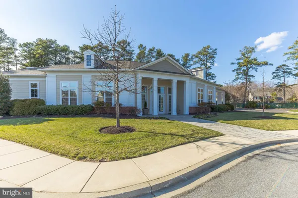a view of a house with swimming pool