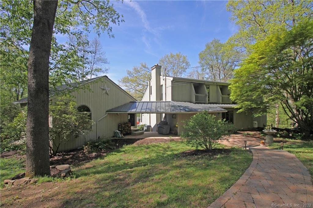 51 Paddy Hollow Road Bethlehem, CT 06751 - Photo 1 of 1 a front view of a house with garden
