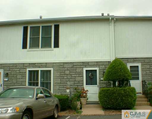 4905 Hana Road Edison, NJ 08817 - Photo 1 of 2 a view of a house with a car parked front