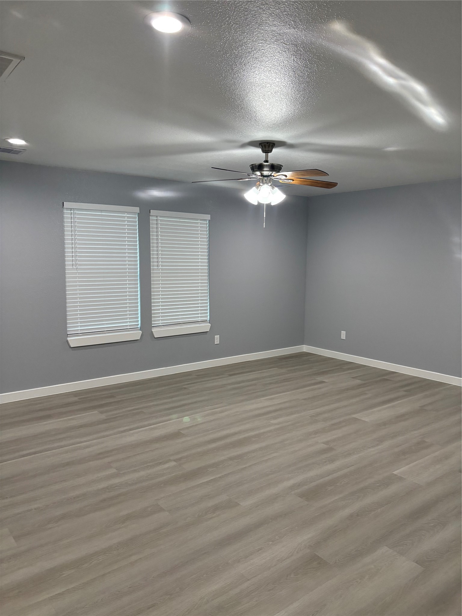 1809 Reese Street Houston, TX 77012 - Photo 15 of 23 a view of an empty room with wooden floor
