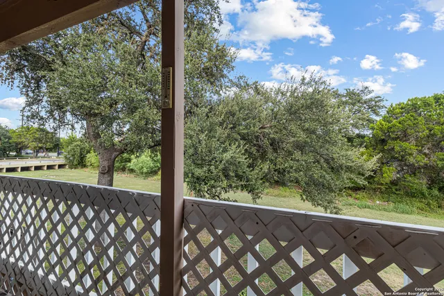 a view of a street from a balcony