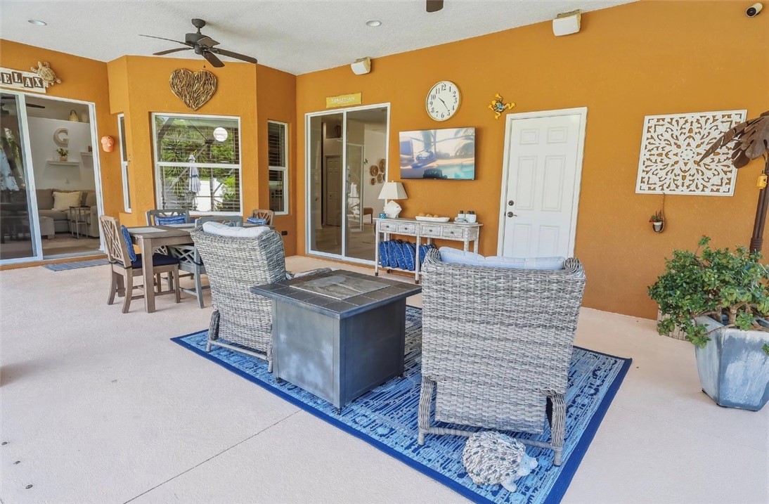 1771 Mistletoe Street Sebastian, FL 32958 - Photo 28 of 36 a living room with furniture and a potted plant