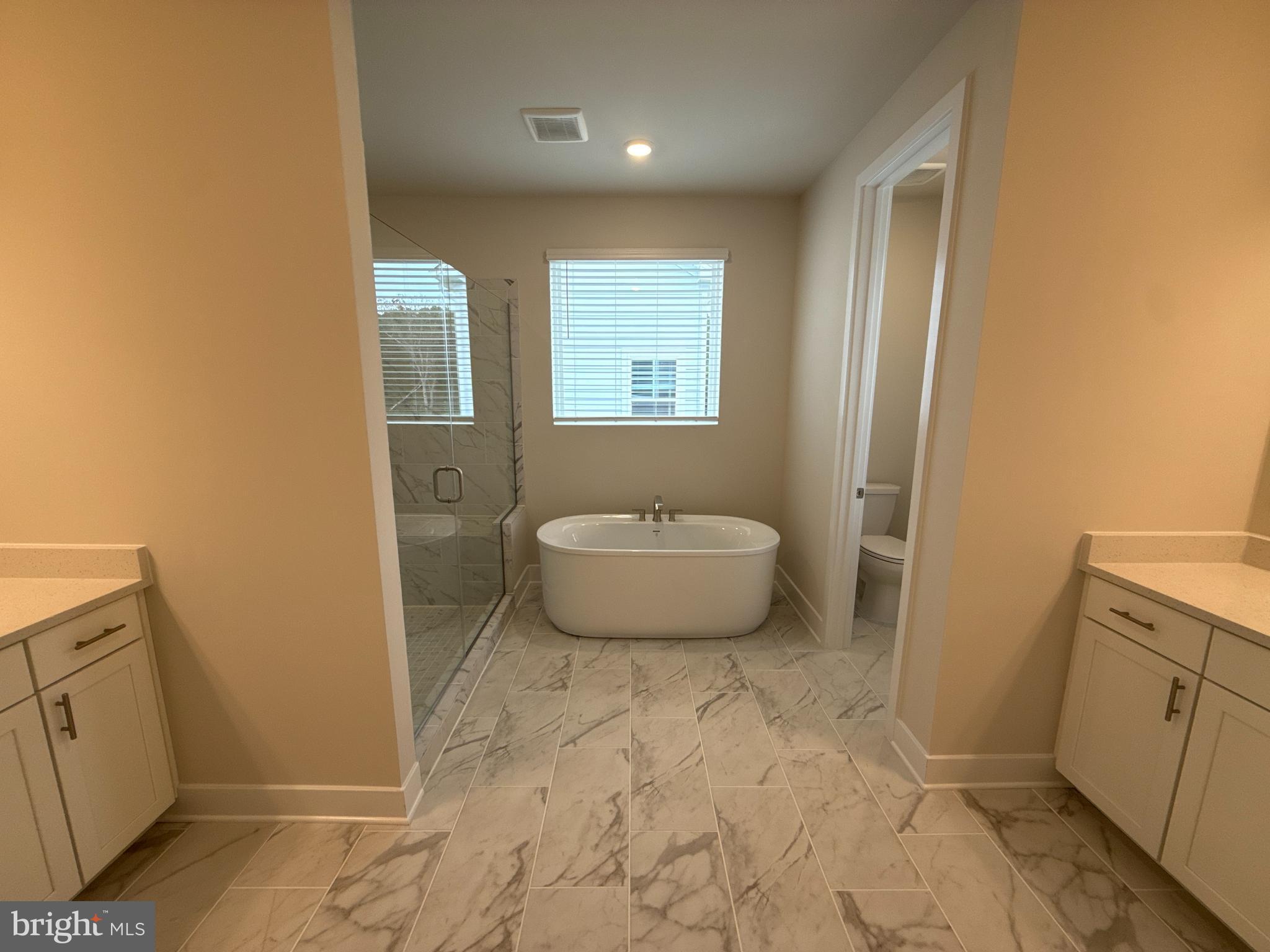 116 Stilly Way Annapolis, MD 21403 - Photo 8 of 21 a spacious bathroom with a sink toilet and shower