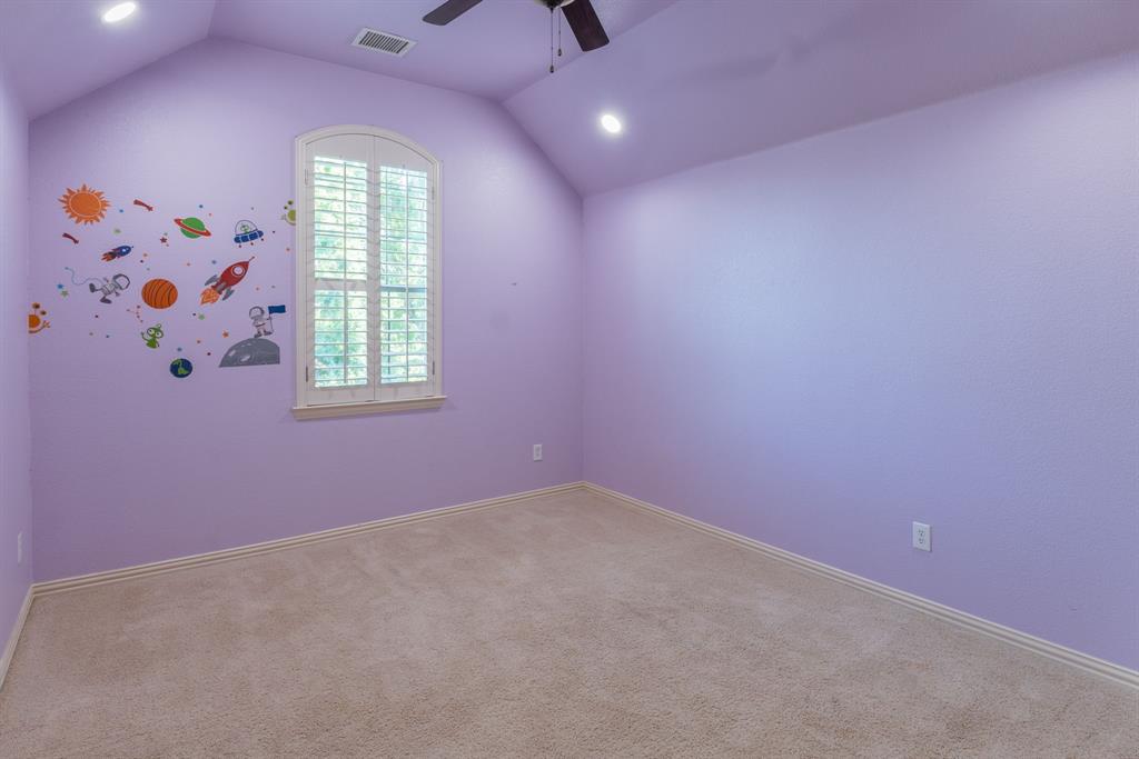 11775 Frontier Drive Frisco, TX 75033 - Photo 29 of 40 an empty room with windows and closet