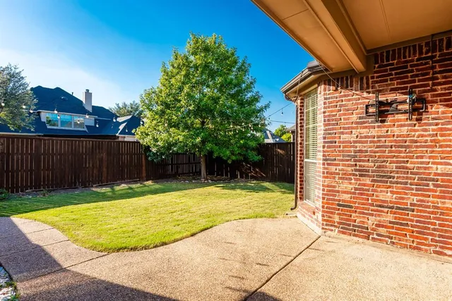 a view of a backyard with a small pool