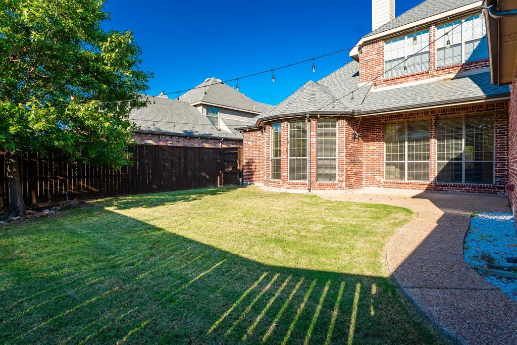 11775 Frontier Drive Frisco, TX 75033 - Photo 36 of 40 a view of a house with a yard and sitting area