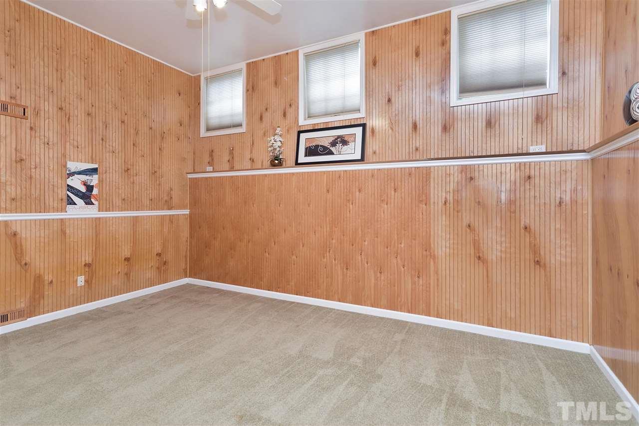 7314 Doverton Court Raleigh, NC 27615 - Photo 27 of 30 a view of an empty room