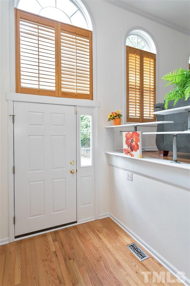 7314 Doverton Court Raleigh, NC 27615 - Photo 4 of 30 a view of an empty room with a window
