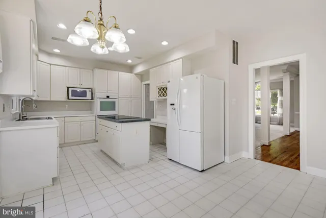 a view of staircase with white walls and railing