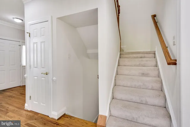 a view of an empty room with a fireplace