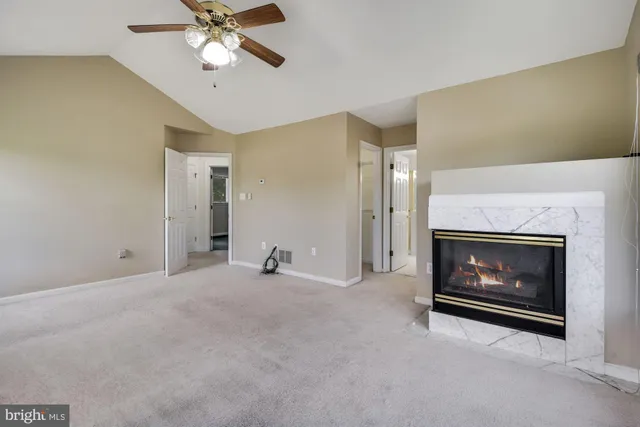 a bathroom with a tub a sink and mirror