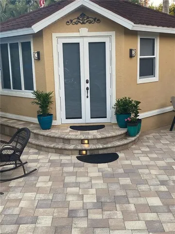 a view of a entryway door front of house