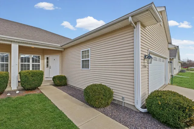 a house view with a garden space