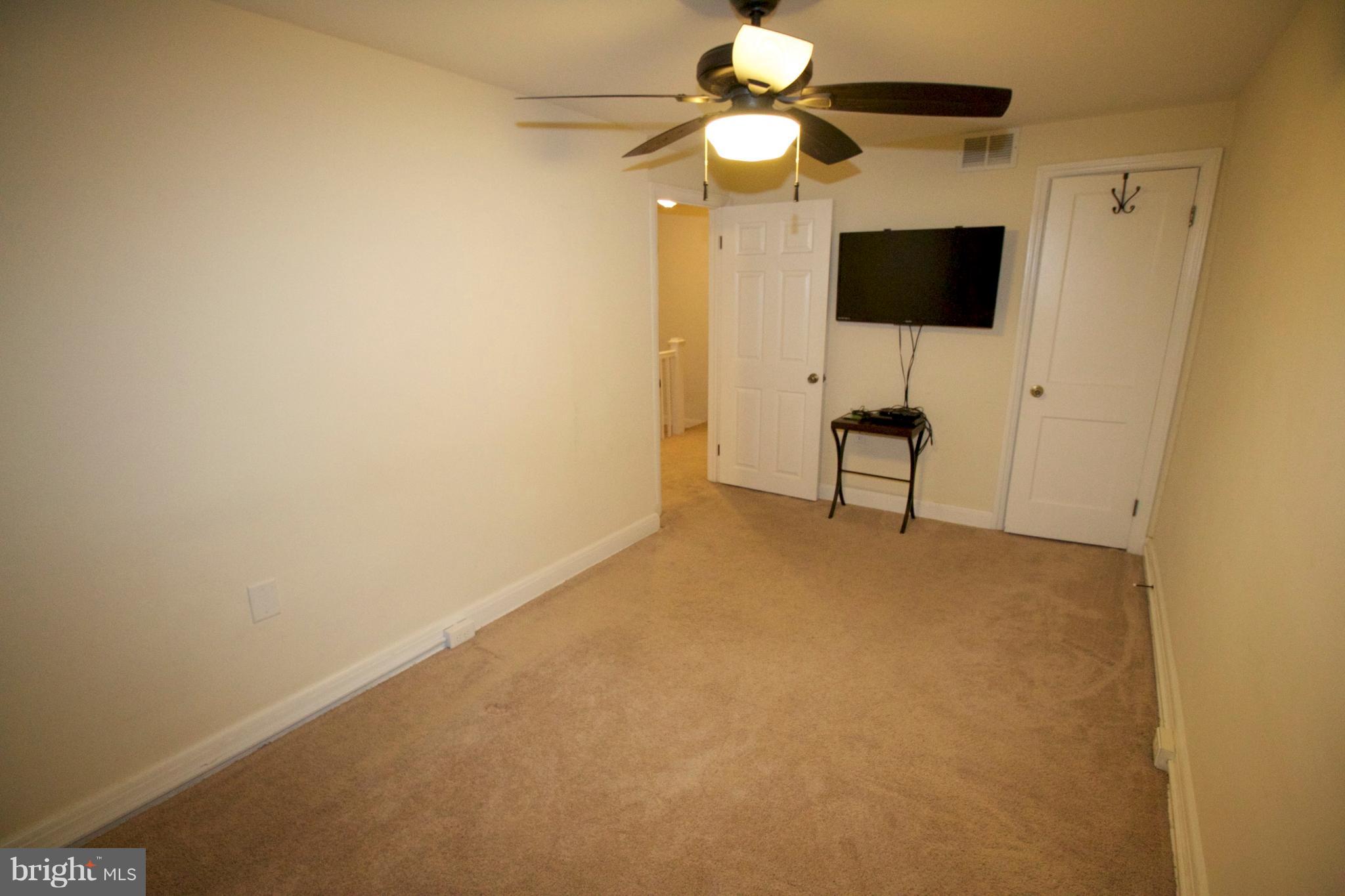 512 Old Riverside Road Baltimore, MD 21225 - Photo 29 of 38 a view of a livingroom with a flat screen tv