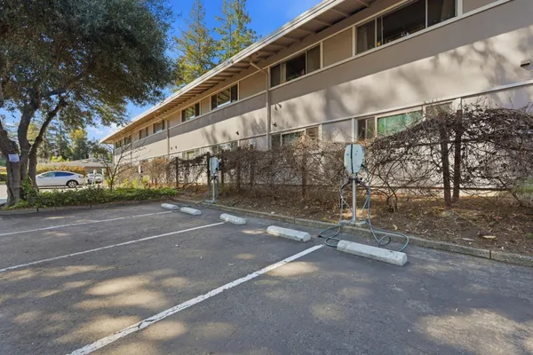 a view of a street with a building