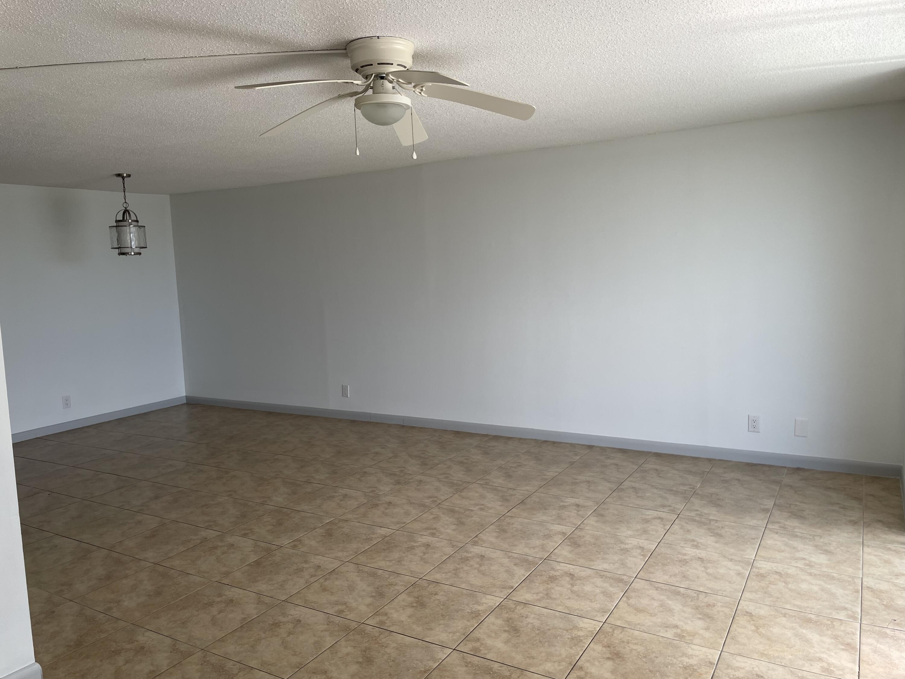 5700 Northwest 2nd Avenue, Unit 711 Boca Raton, FL 33487 - Photo 11 of 29 Dining area and living room