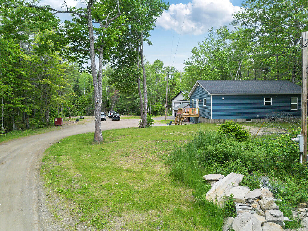 128 Boots And Saddle Road Palermo, ME 04354 - Photo 7 of 39 Coming down the driveway