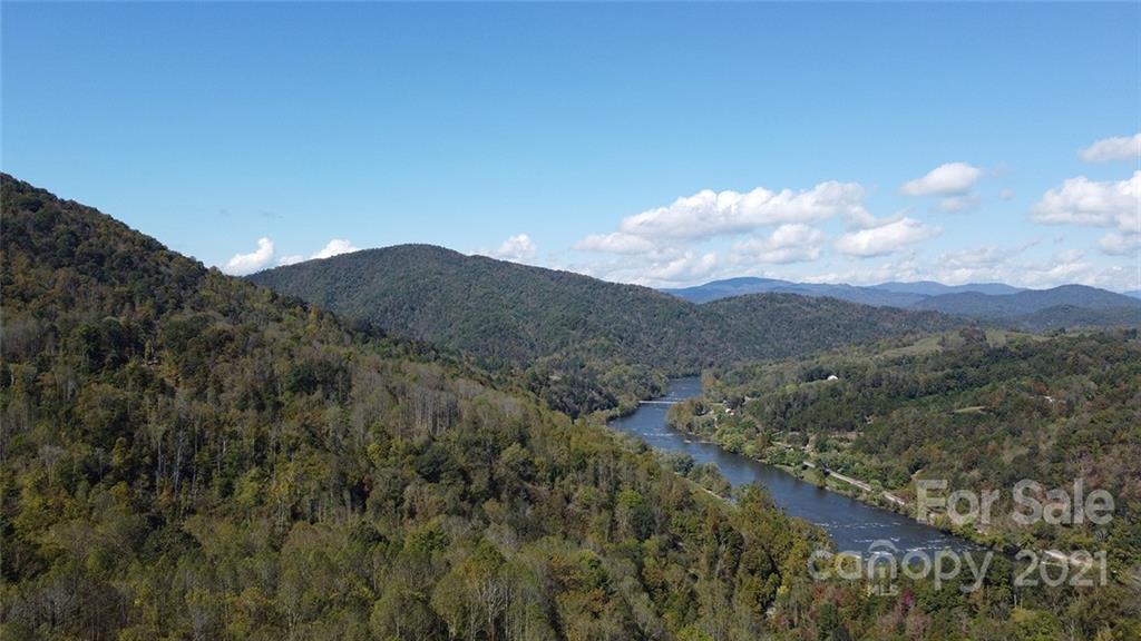 980 Anderson Branch Road Marshall, NC 28753 - Photo 1 of 18 a view of a dry yard with mountains in the background