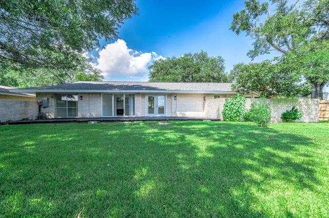a view of a backyard with a garden